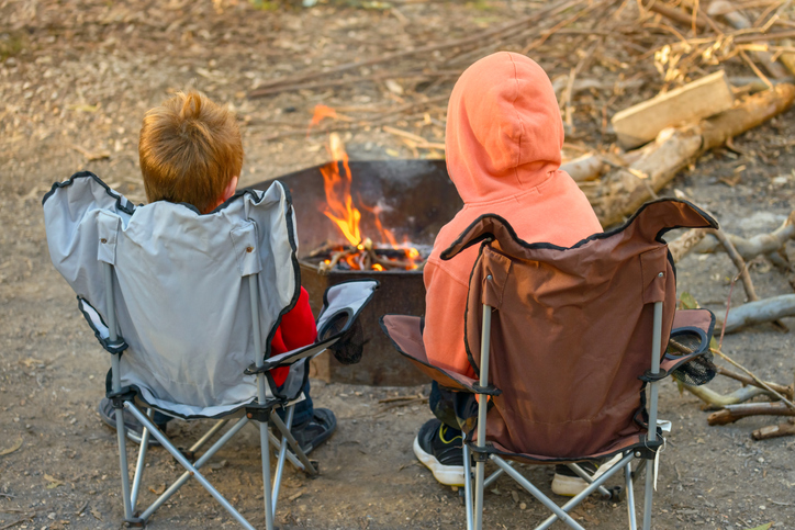 Kids burning a fire at Kuitpo forest camping ground during winter school holidays, Northern NSW Coast - Byron Bay